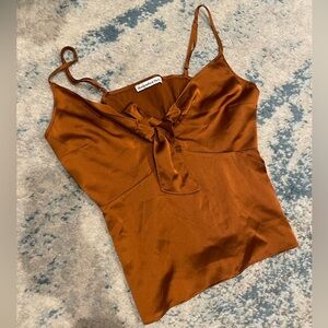 size SMALL burnt orange tank with bow